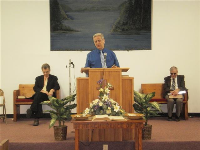 Brother George Gray preaching